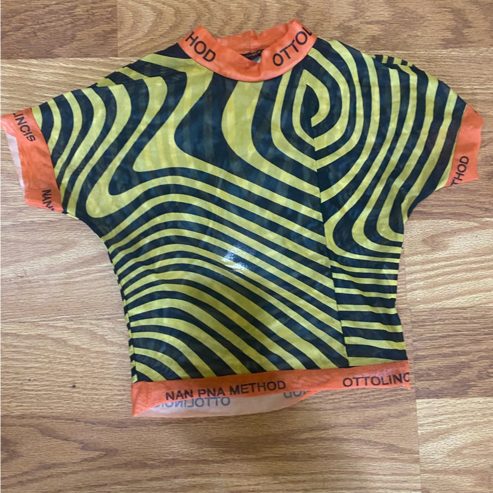 Two piece yellow and black pants outfit. It is shared 30 size medium.